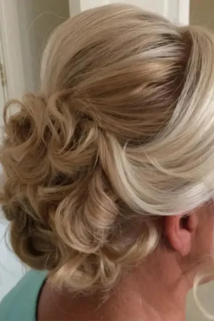 Curly Bun with Long Straight Bangs