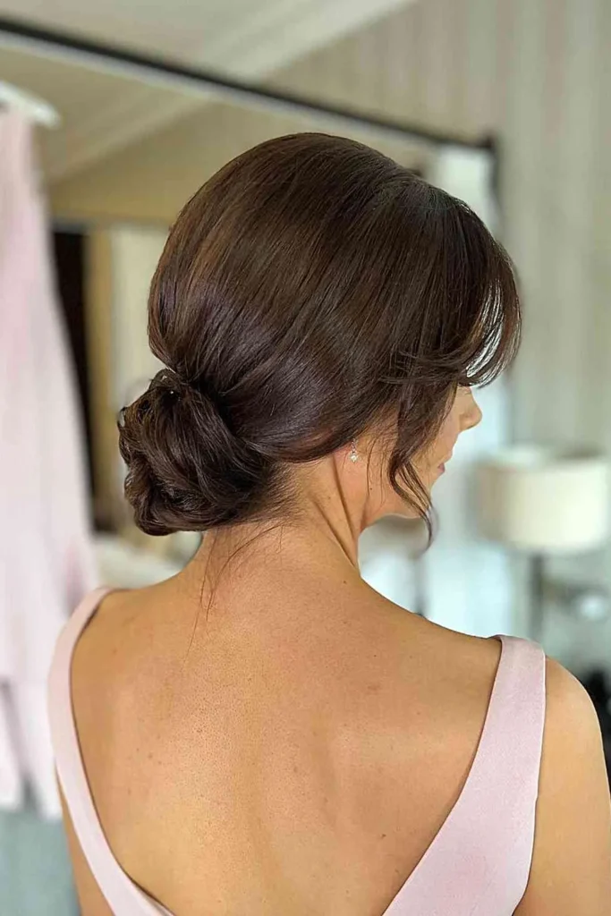 Loose Updo with Face-Framing Strands
