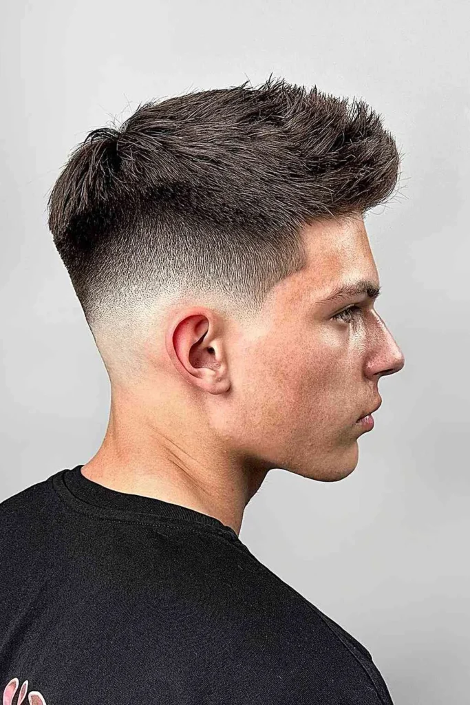 Low Skin Fade with a Messy Quiff Top