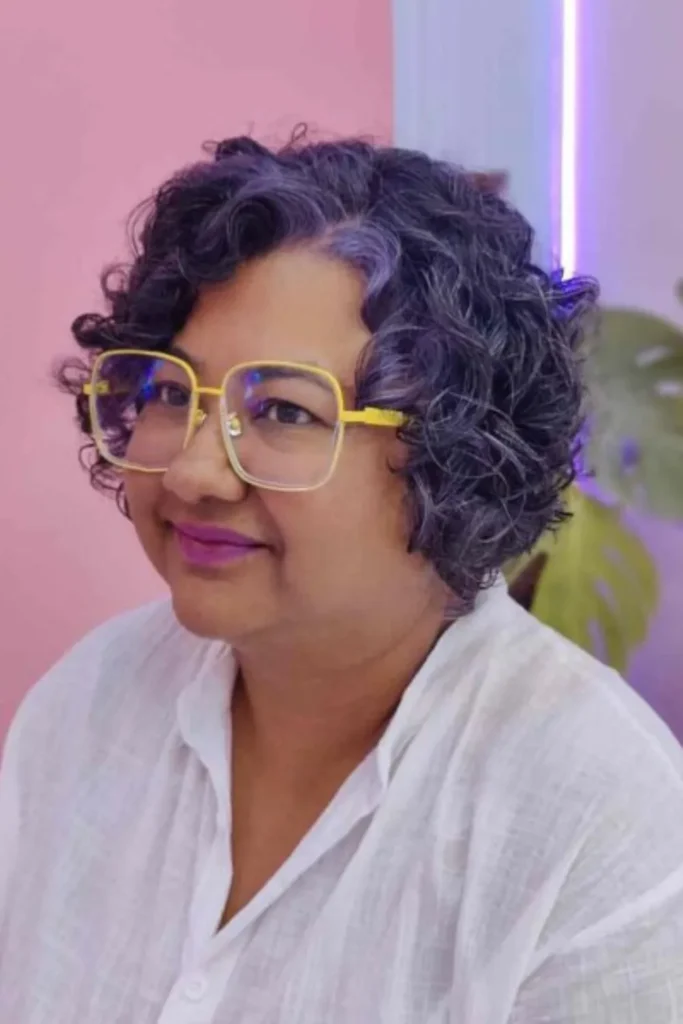 Side Part Curly Bob with Violet Highlights