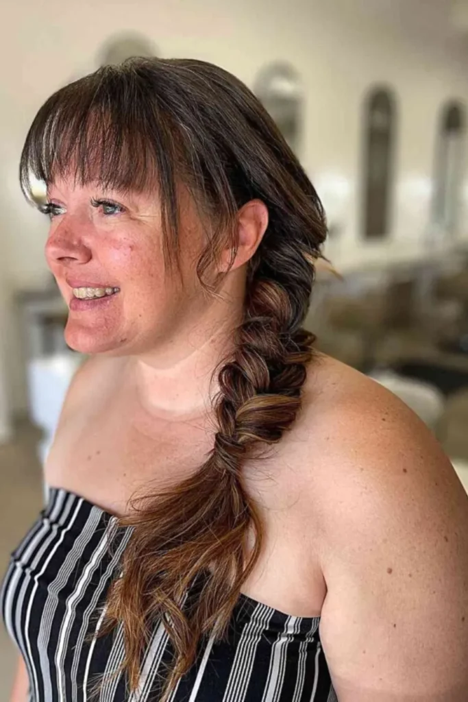 Side-Swept Braided Style with Bangs