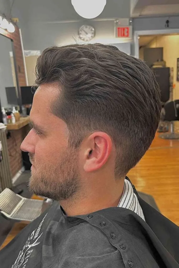 Subtle Wavy Slick Back with Low Fade