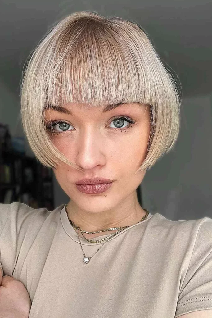 Very Short Hair with Blunt Bangs and Choppy Layers