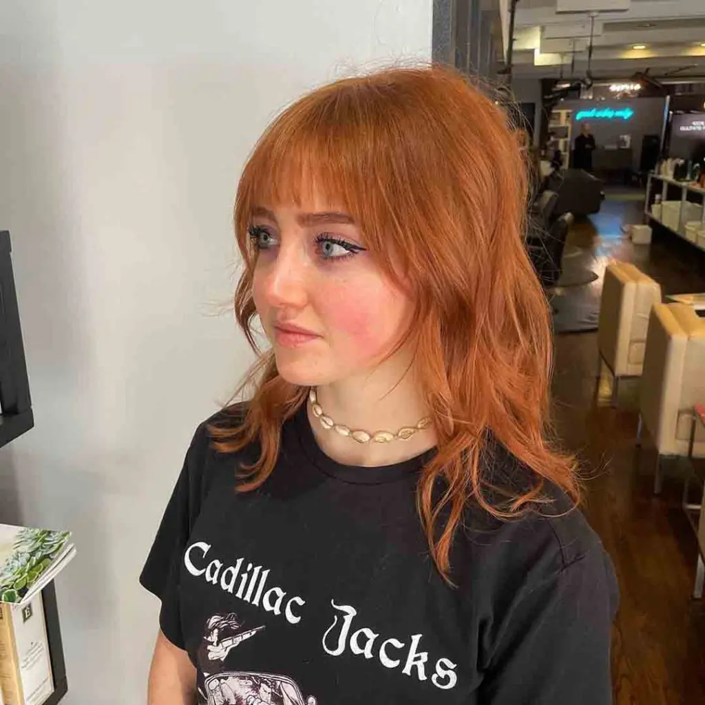 70’s Style Ginger Shaggy Wolf Cut With Choppy Bangs