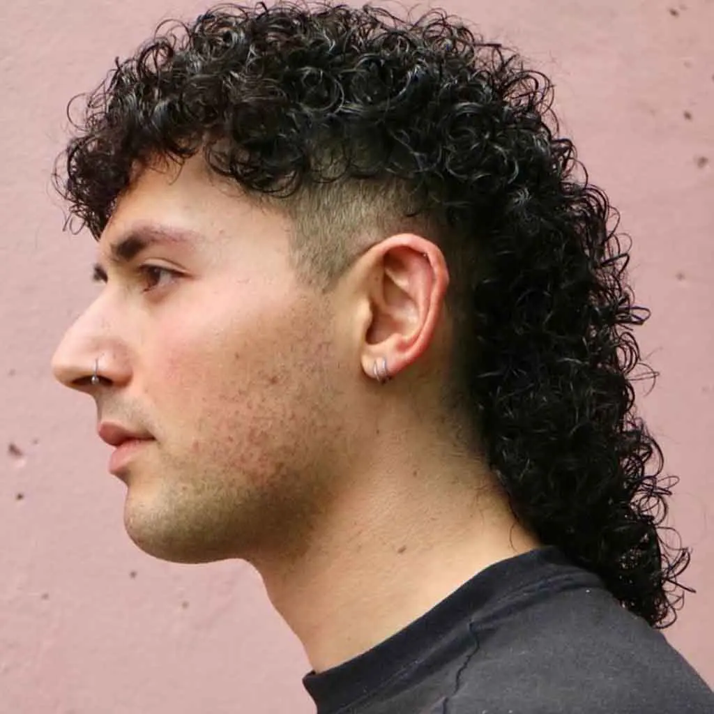 Curly Wolf Cut with Bangs and Undercut