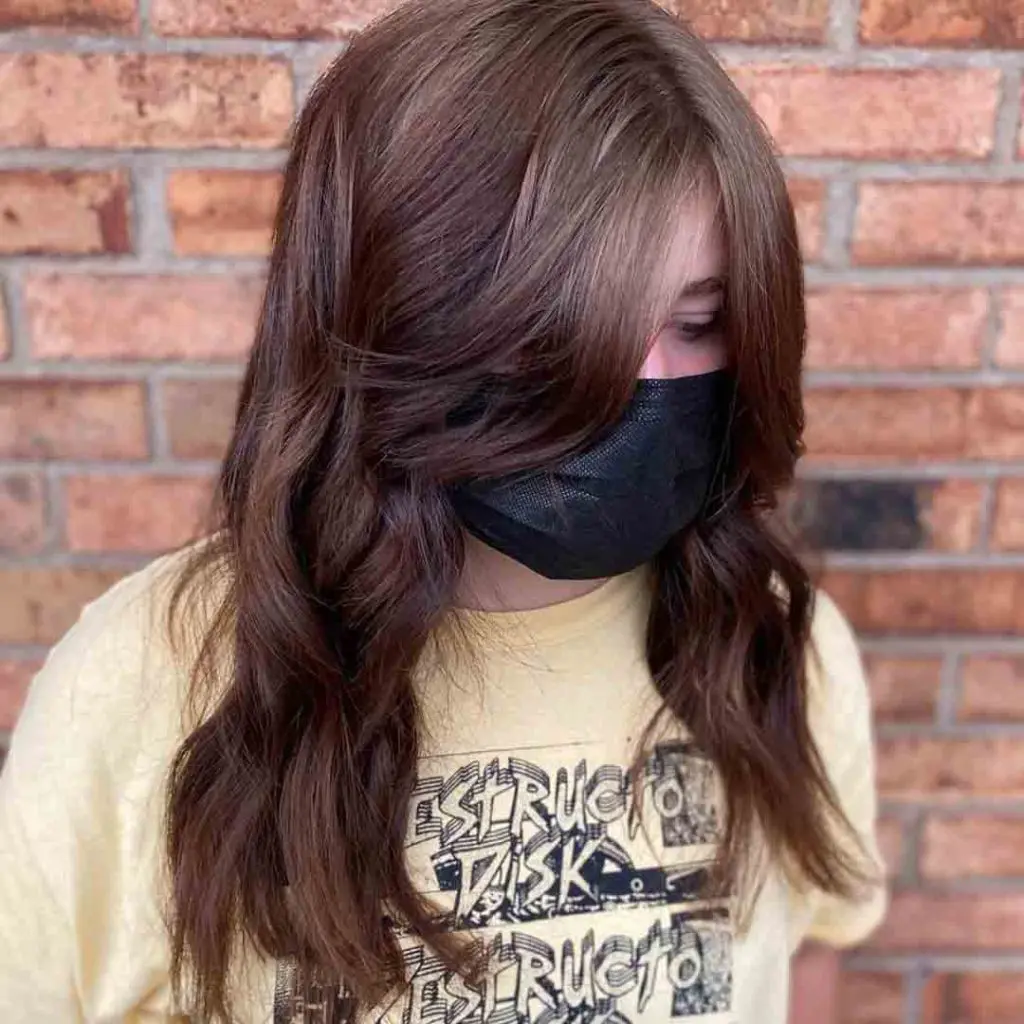 Layered Wolf Cut on Wavy Brown Hair