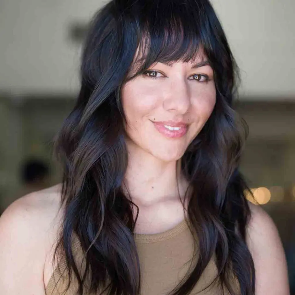 Long Wavy Wolf Cut With Fringe Bangs