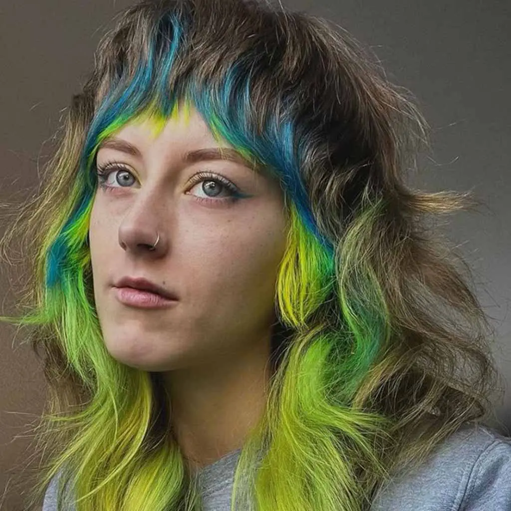 Shaggy Wolf Cut With Tousled Colorful Bangs and Front Layers