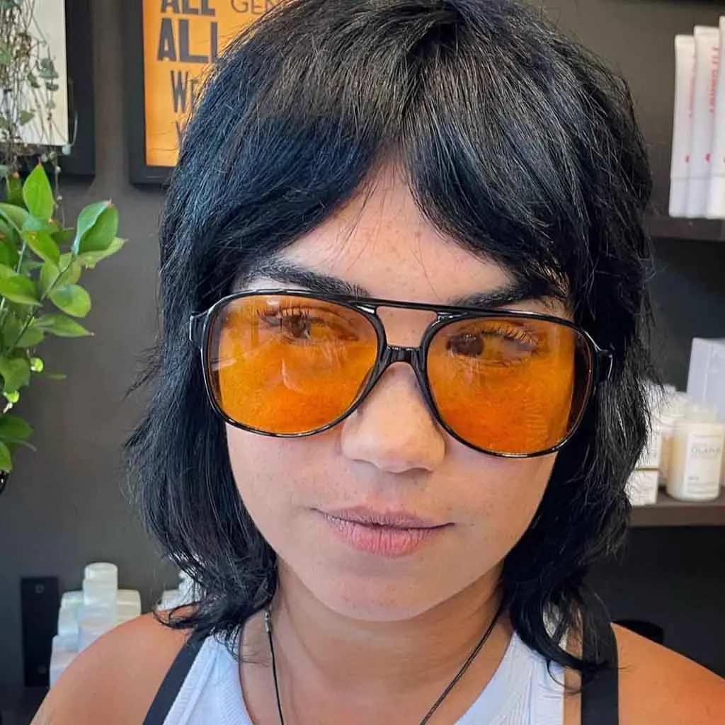 Short Wolf Cut With Short Curtain Bangs on Black Hair