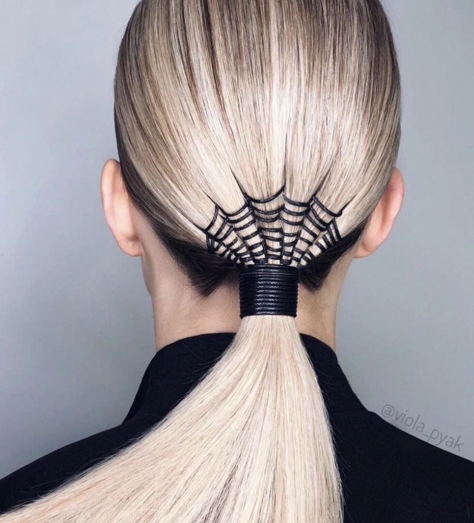 Sleek Long Ponytail with Spiderweb Detailing