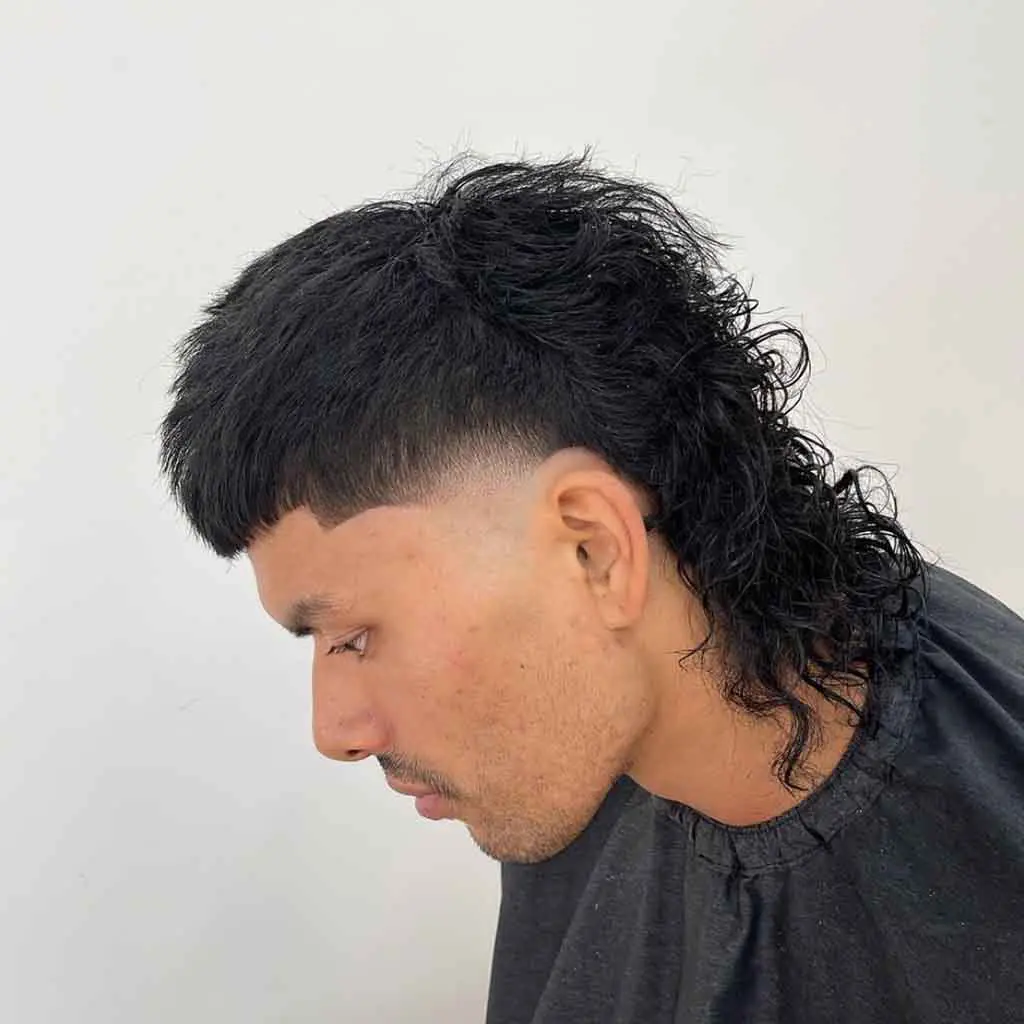 Textured Mullet Wolf Cut With Curly Ends and Micro Bangs