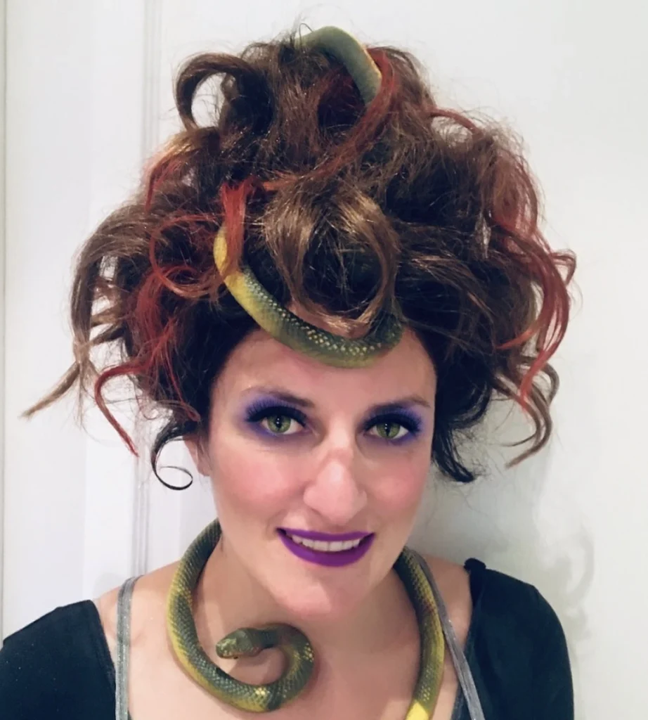Wildly Creative Messy Bun with Snake Accents for Medusa Look