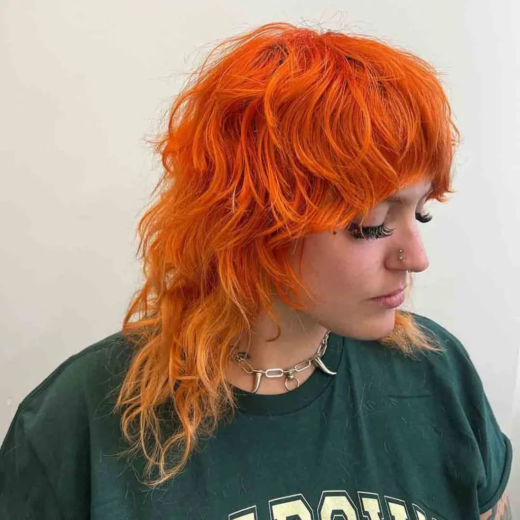Wolf Cut on Wavy Bright Orange Hair